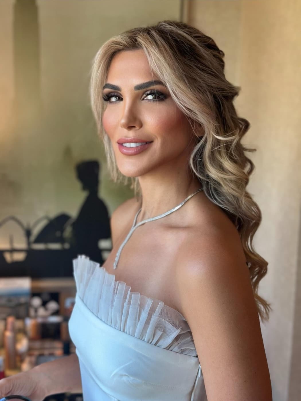 Glam side-swept curls and soft glam makeup Los Angeles | LA Makeup Studio